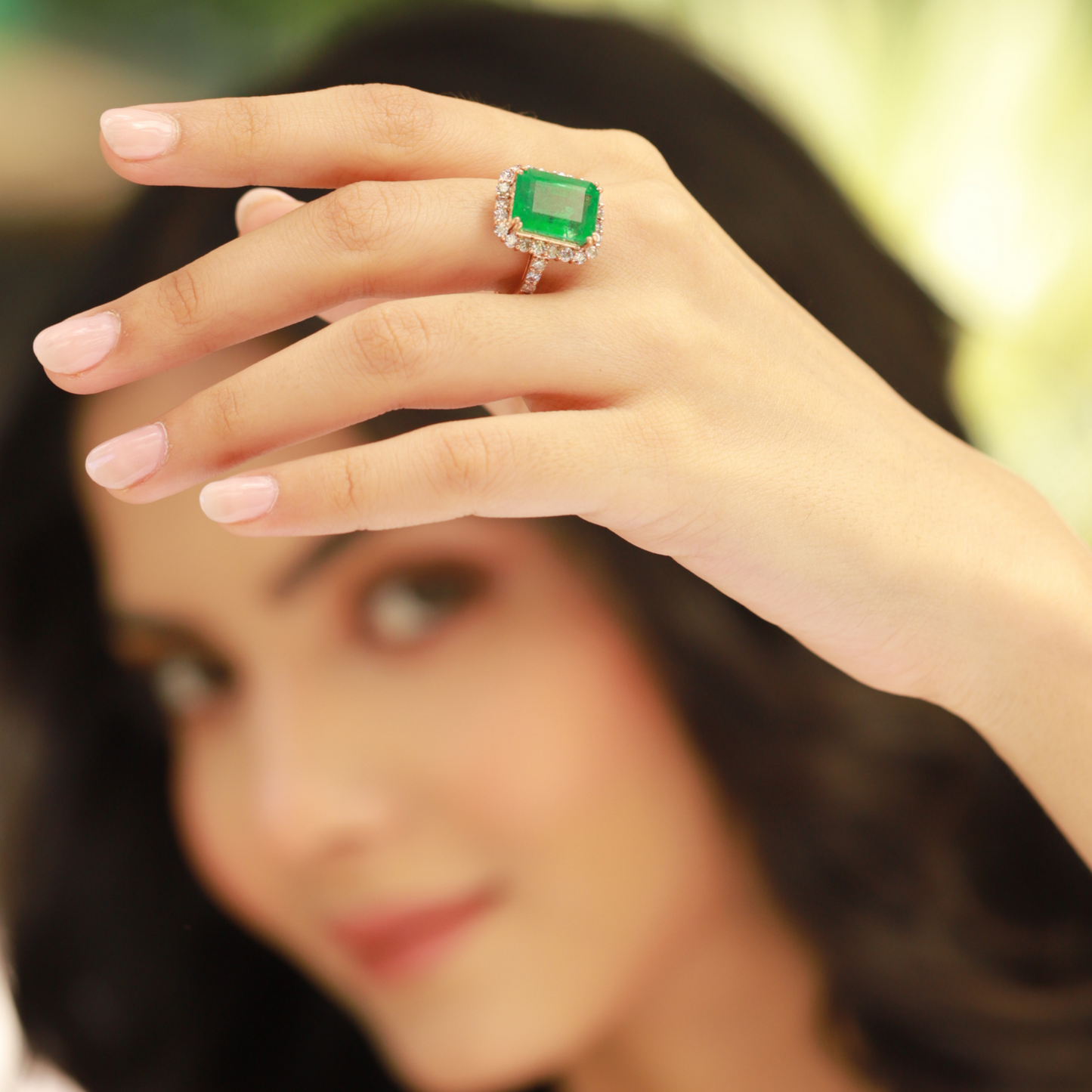 Emerald Ring with Diamond Halo